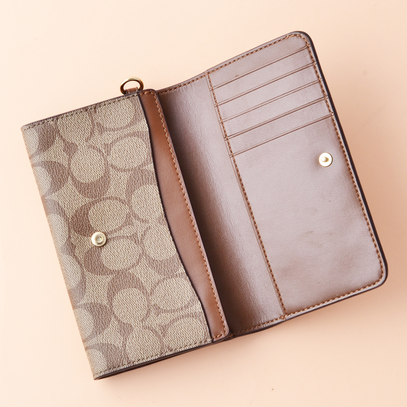 coach half flap signature card case tan rust