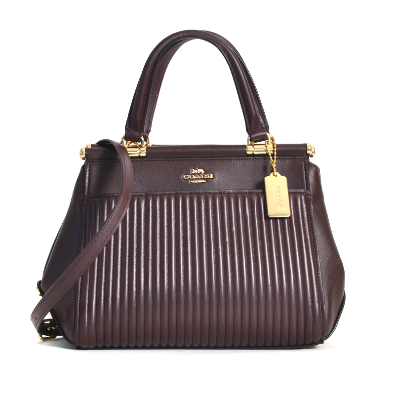 Grace bag with hotsell quilting and rivets